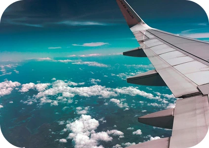 Airplane wing in the sky