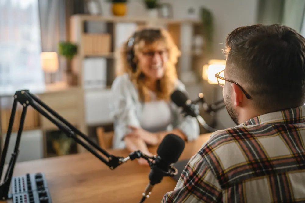 woman interviewing man